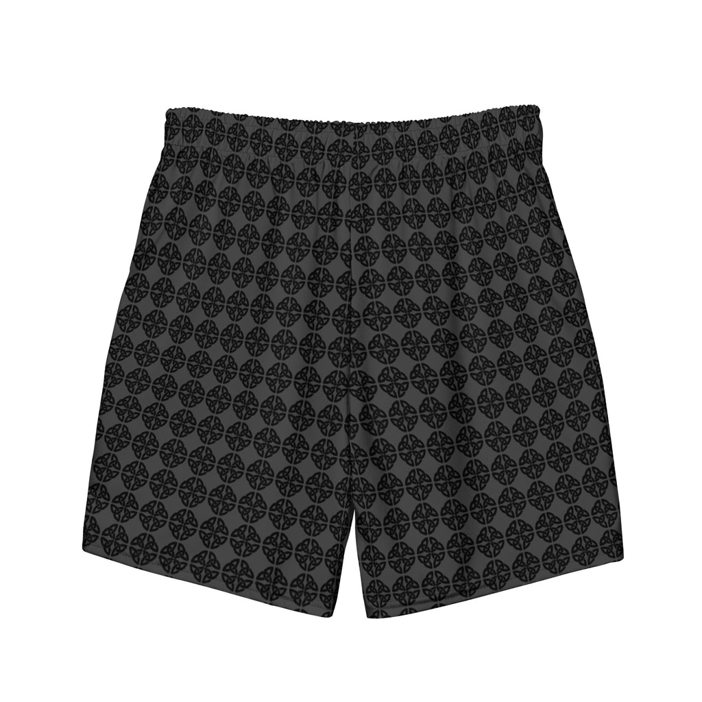 black and gray swim trunks back shot flat white background.